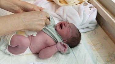 Rischio soffocamento per i teli sul passeggino